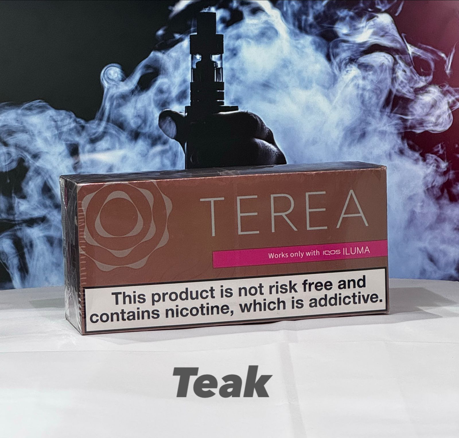 IQOS TEREA Teak Italy device packaging with smoke effect in the background