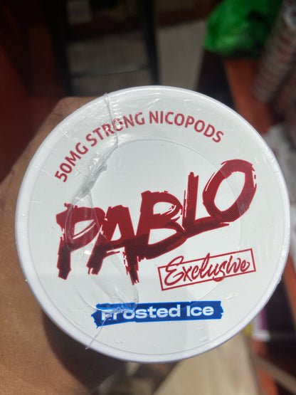 Pablo Nicotine Pouches Frosted Ice flavor 50mg Strong Nicopods Container held by a hand