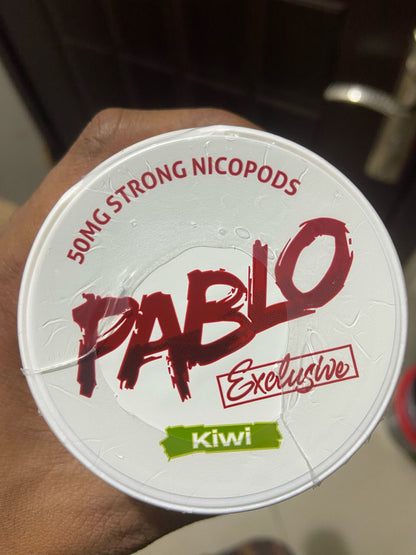 Pablo Nicotine Pouches Kiwi flavor 50mg Strong Nicopods Container held by a hand