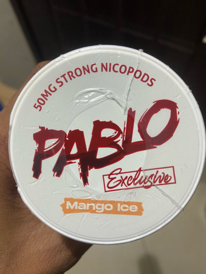 Pablo Nicotine Pouches Mango Ice flavor 50mg Strong Nicopods Container held by a hand