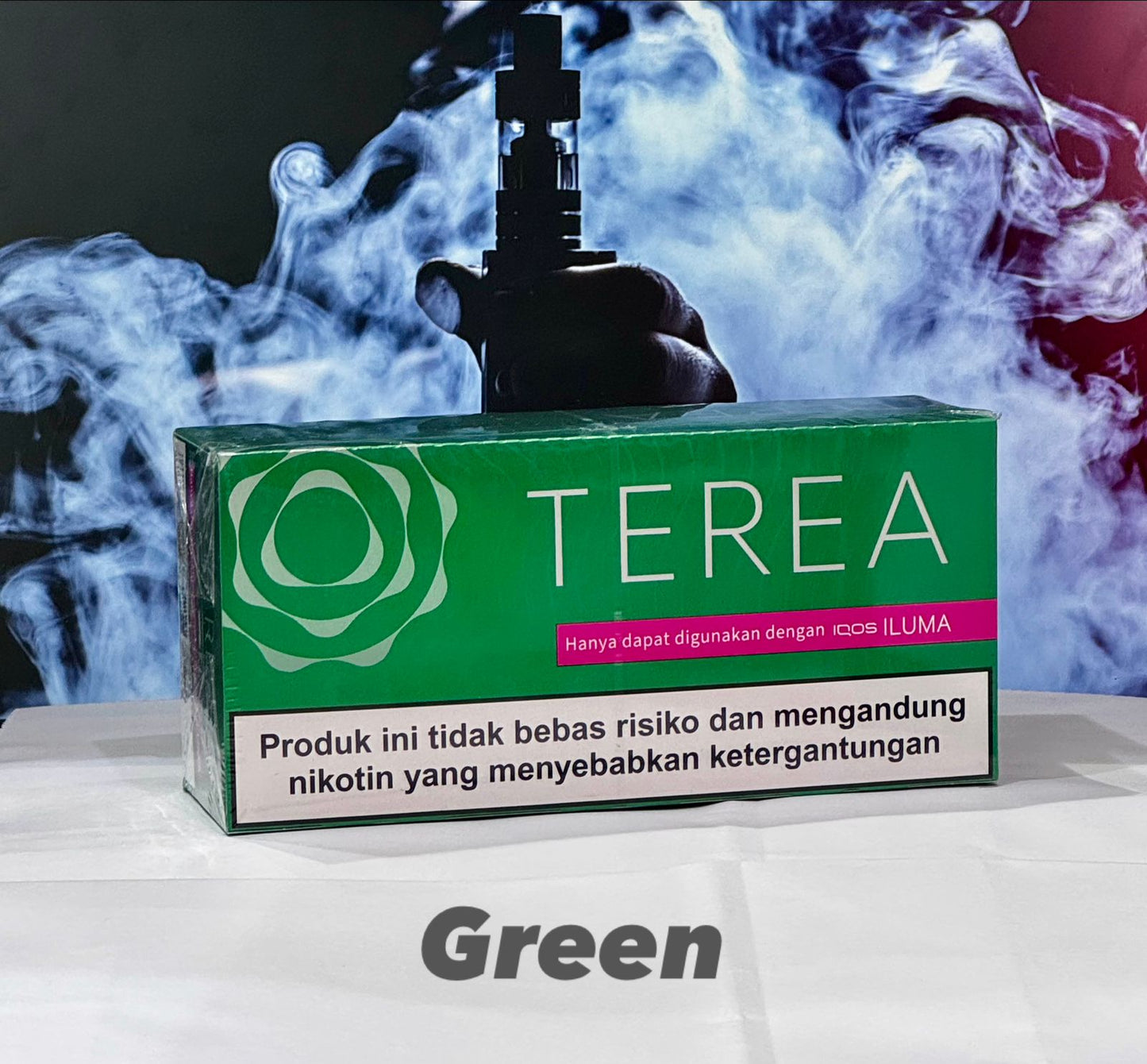 TEREA Indonesia Sticks Green flavor for IQOS ILUMA with smoke effects in the background
