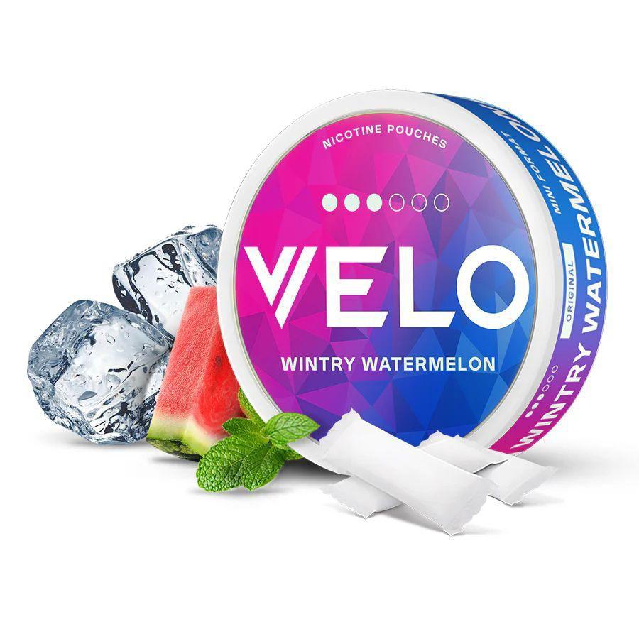 VELO nicotine pouches wintry watermelon flavor with ice cubes, and mint leaves on a white background
